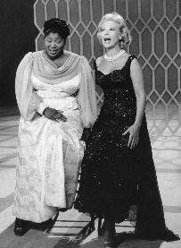 Dinah Shore singing on her show with Mahalia Jackson. Dinah Shore singing on her show with Mahalia Jackson.