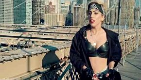 Shots of Lady Gaga on the Brooklyn Bridge are interspersed with fan videos in Google’s Chrome ad.