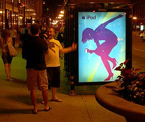 Illuminated iPod poster ad at Chicago bus stop kiosk, June 2008. Illuminated iPod poster ad at Chicago bus stop kiosk, June 2008.