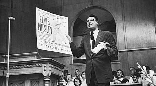 Aug 1956: Baptist preacher Robert Gray, holding Elvis poster, denounces the singer in Jacksonville, FL. Photo, R. W. Kelley, Life magazine. Baptist preacher Robert Gray, holding Elvis poster, denounces singer in Jacksonville, FL. Photo, R. Kelley/Life.