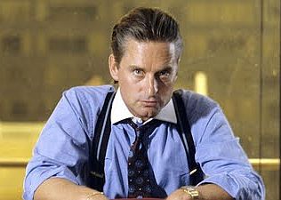 Michael Douglas, inhabiting the character of the ruthless  Gordon Gekko in Oliver Stone’s 1987 film “Wall Street.” Click for story.