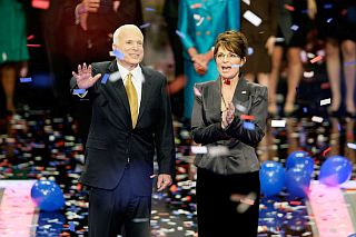 Sept 2008: Republican Presidential and Vice Presidential candidates, Senator John McCain and Gov. Sarah Palin, enjoying the crowd & music on stage at their convention.