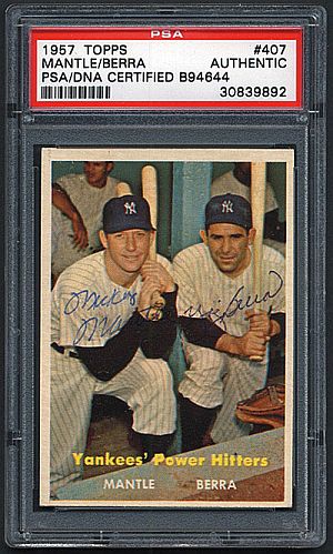 1957 Topps baseball card in collector’s case depicting “Yankees' Power Hitters” Mickey Mantle / Yogi Berra, with authenticated autographs. Robert Edwards Auctions reports this card sold for twelve hundred dollars in 2005.