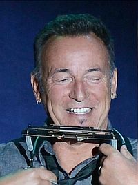 Bruce Springsteen with harmonica.