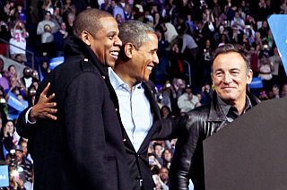 President Barack Obama on stage at Columbus, Ohio rally Nov. 5, 2012, flanked by Jay-Z and Bruce Springsteen.