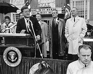 JFK in Fort Worth with Sen. Ralph Yarborough, Gov. John Connally and Vice President Lyndon B. Johnson behind him.
