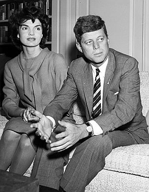 March 1958: Jacqueline Kennedy and JFK during a reception at the University of Southern California.