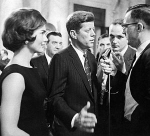 Jan 1960: JFK being interviewed shortly after announc-ing his candidacy with Jackie by his side, U.S. Senate Caucus room, Wash., D.C. Photo, Hank Walker, Life.