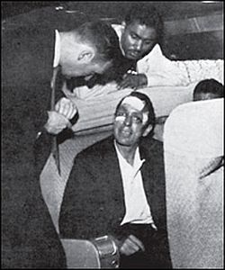May 15, 1961: Freedom Rider James Peck,  talks with a Dept of Justice official and Ben Cox on plane to New Orleans. Photo, T. Gaffney.