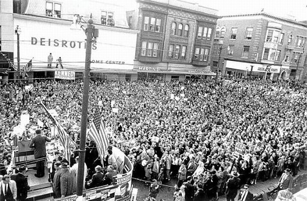 October 28, 1960: JFK – on platform, lower left -- speaks to an overflow crowd jamming the downtown area of Hazelton, Pennsylvania (streets to Kennedy's left, not shown, were equally jammed). The Hazelton stop was among at least a dozen other Pennsylvania towns he visited that day.