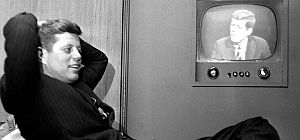 April 3rd, 1960: JFK watching a TV playback of an earlier TV appearance in Milwaukee, Wisconsin leading up to the April 5th Wisconsin primary. AP photo.