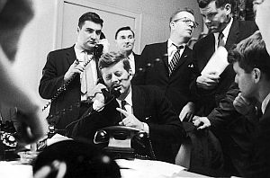 April 5, 1960: JFK & team working the phones on WI primary night. Behind JFK from left: Pierre Salinger, Kenny O’Donnell and Larry O’Brien. RFK is on the extreme right.