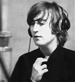 1966: John Lennon during recording sessions for the Beatles album, “Revolver.”