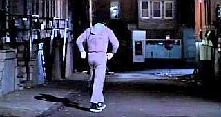 Rocky begins his pre-dawn run, moving away from his stoop.