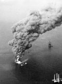 December 1970: Smoke from Shell Oil's burning oil rig in the Gulf of Mexico.