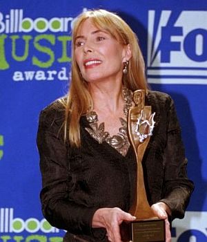 December 1995: Joni Mitchell with the Billboard Century Award, for “distinguished creative achievement.”
