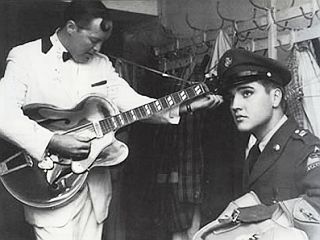 Bill Haley and Elvis Presley meeting backstage in Stuttgart, Germany in Oct 1958. Presley was stationed in Germany.