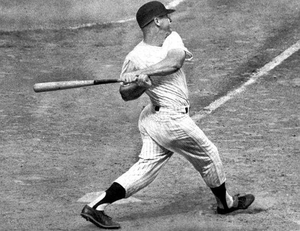 1964: Switch-hitting Mickey Mantle of the New York Yankees showcasing his powerful swing from the left side. 