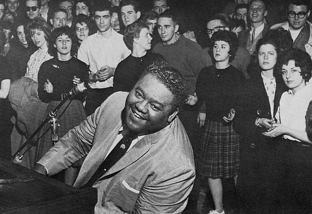 February 1962: Fats Domino at the piano performing before a crowd of mostly white students at Franklin & Marshall College in Lancaster, Pennsylvania.