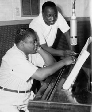 1956: Fats Domino and Dave Bartholomew at work in recording studio, a team that proved effective in turning out early R&B and rock ’n roll tunes. Click for '...Songbook'.