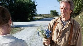At Roseman Bridge, Robert had picked a bouquet of wildflowers for Francesca.
