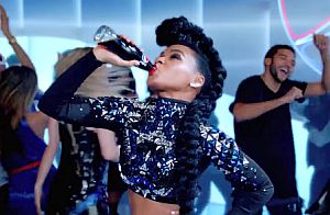 Janelle Monáe in 2016 Super Bowl ad for Pepsi, dances to “Do You Love Me?” in 1960s segment of the ad. Click for her CD.