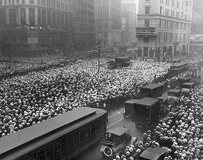 Interest in the fight was keen, as this photo illustrates, showing a crowd of more than 10,000 outside the New York Times building in Times Square awaiting updates.