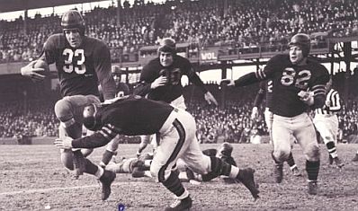 Sammy Baugh, No. 33, making a run in another game.