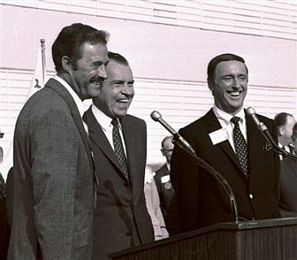 Richard Nixon, center, is flanked by Dan Rowan, left, and Dick Martin right, of ‘Rowan and Martin's Laugh-In’ TV show at October 1968 campaign stop in Burbank, CA.  Nixon appeared on  ‘Laugh-In’ in mid-Sept 1968 in the humorous 'sock-it-to-me' segment, covered later below.  (AP photo)