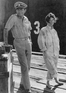 Ava Gardner with Gregory Peck on the set for 1959 film, ‘On The Beach.’ Click for DVD.