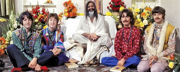 The Beatles with the Maharishi Mahesh Yogi (center) sometime before their trip to India, possibly August 1967, in Bangor, Wales. From left: Paul McCartney, John Lennon, George Harrison, and Ringo Starr.