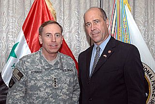 After his election to Congress in 2006, Rep. John Hall was soon engaged in the public policy process, including matters such as the war in Iraq.  He is shown here with Army General David Petraeus on a visit to Iraq in October 2007.