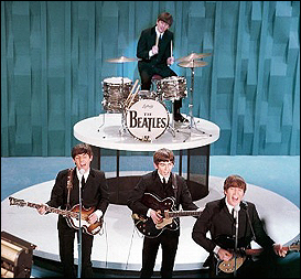 Beatles performing on ‘Ed Sullivan Show,’ Feb 9, 1964, before estimated TV audience of 73 million. Click for DVD.