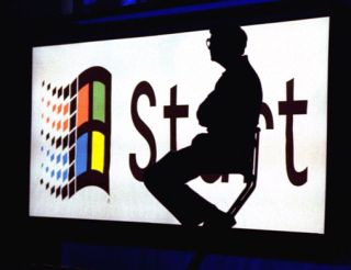 Bill Gates silhouetted against the “start” button during a video portion of the Windows 95 launch at Microsoft  in Redmond, Washington, August 1995. AP photo.