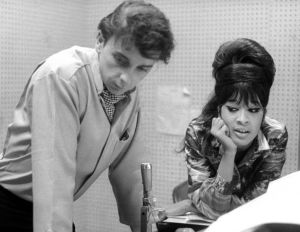 Phil Spector and Ronnie Bennett working on Ronettes music in L.A. recording studio, 1963.