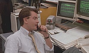 Bud Fox at his trading desk where he sets out to make some quick bucks doing deals for Gordon Gekko.