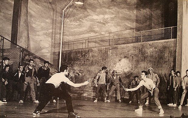 “Rumble” scene, 1957 stage production of “West Side Story” -- Jets leader vs. Sharks leader in knife fight. Click for film.