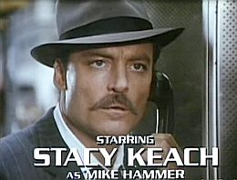 Screen shot from the 1980s’ TV show “Mike Hammer” with Stacy Keach in the lead role. Click for DVD.
