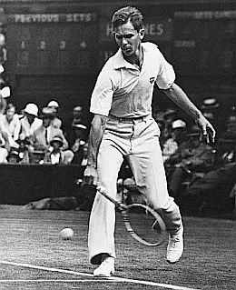 Ellsworth Vines in play vs. Henri Cochet of France at Wimbledon, May 7, 1933.