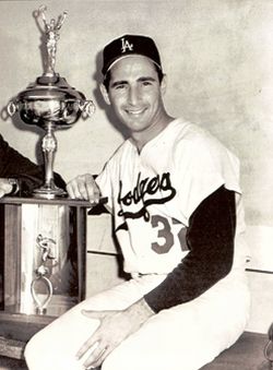 Sandy Koufax with “Player of the Year” trophy for 1965.