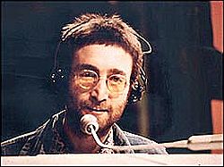 John Lennon at work, undated.