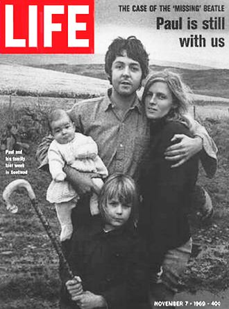 Paul McCartney, shown with Linda & family in a November 1969 Life magazine cover photo taken in Scotland to dispel popular rumors that Paul was dead. Click for copy.