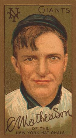 An American Tobacco Co. baseball card of Christy Mathewson in 1911; “gold border” series issued by AT’s cigarette brands. Click for full card in case.