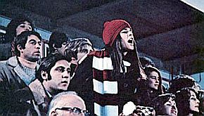 Love Story: Jenny Cavilleri at Harvard ice hockey game, cheering on new found friend, Ollie Barrett.