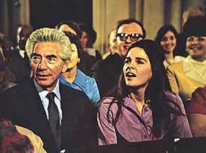 Love Story 1970: Jenny Cavilleri & her dad “Phil,” played by John Marley, attending Ollie’s graduation. Love Story 1970: Jenny Cavilleri & her dad “Phil,” played by John Marley, attending Ollie’s graduation.