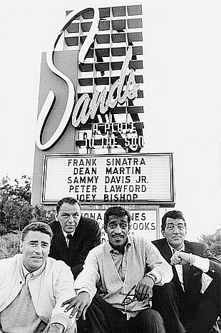Rat Pack members without Joey Bishop, from left: Peter Lawford, Frank Sinatra, Sammy Davis, Jr., and Dean Martin. Photo, Life magazine, 1960. Click for Life “rat pack” edition.
