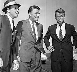 Frank Sinatra, Peter Lawford & Robert Kennedy wait for helicopter en route to a Cedars-Sinai Hospital charity event in Hollywood, July 1961.