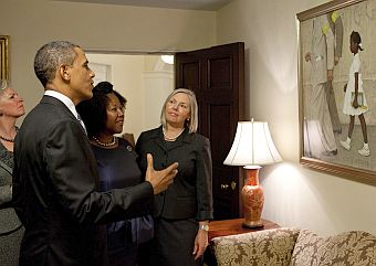 July 15, 2011: President Obama with Ruby Bridges (girl in painting), Rockwell Museum CEO, Laurie Moffatt, and behind Obama, Rockwell Museum President, Anne Morgan, viewing Rockwell’s painting at the White House near the Oval Office.  White House photo, Peter Souza.