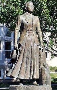 Statue of Katherine Lee Bates on grounds of  Falmouth, MA library.
