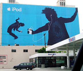 May 2004: Giant iPod silhouettes on building broadside, Santa Monica Blvd, Los Angeles.